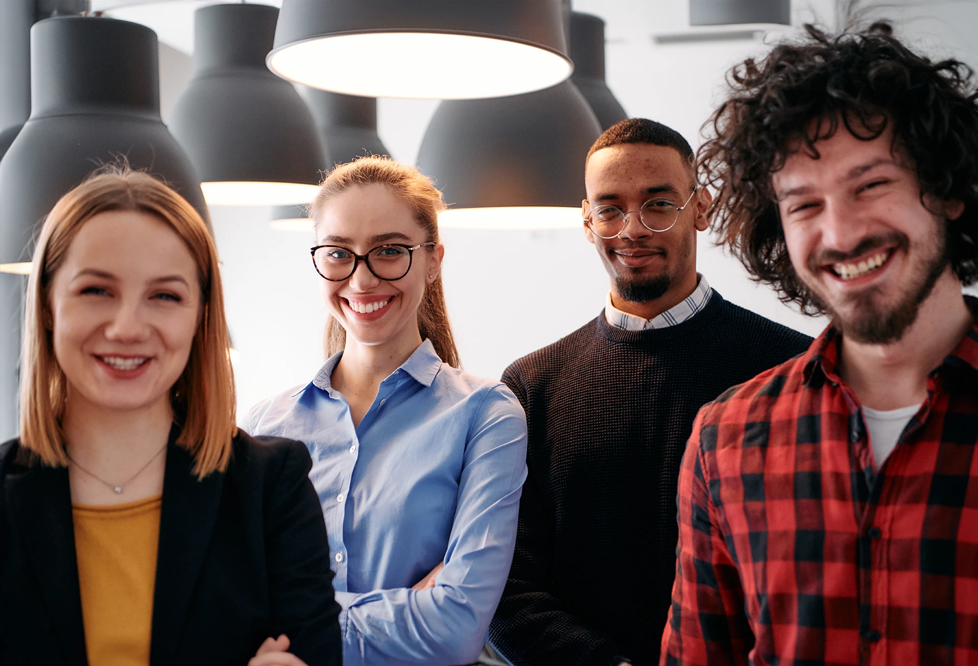 diverse-business-team-standing-united-in-modern