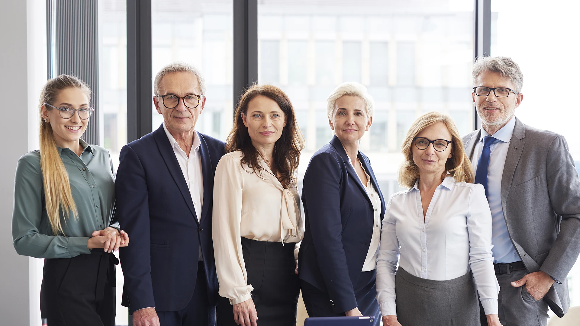 portrait-of-business-people-in-conference-room