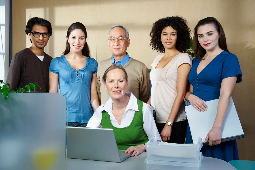 portrait-of-group-of-people-in-office